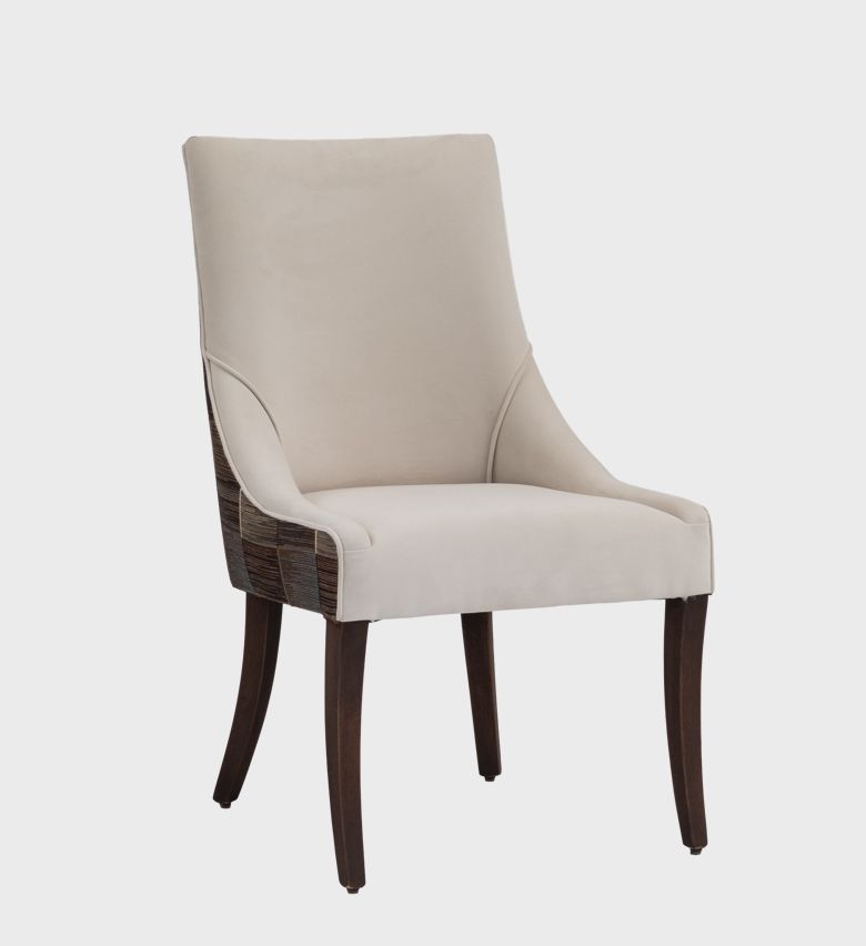 The Catherine Dining Chair MD embodies understated glamour with its sleek silhouette and tailored upholstery.