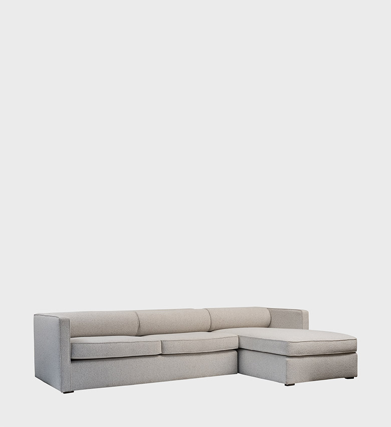 The Sophie Corner Unit is a sleek, contemporary sectional designed for effortless comfort. Upholstered in a soft, light‑gray fabric, it features clean lines and a low profile that exude modern sophistication.