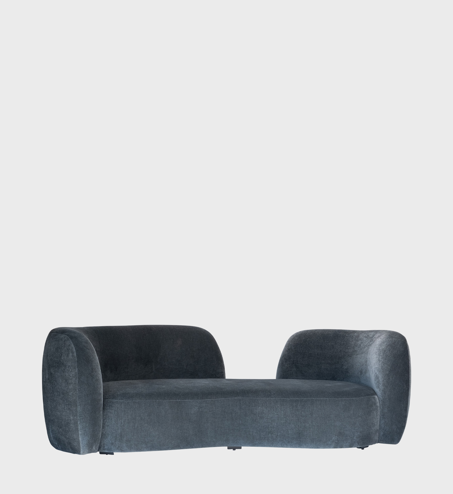 The Harper Sofa is a sculptural masterpiece of modern design. Upholstered in a deep slate‑blue velvet, it features smooth, rounded contours that create a sense of fluidity and comfort.