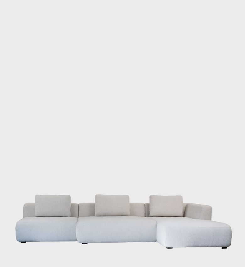 The Luyanda Corner Unit is a statement of modern minimalism and modular comfort. Upholstered in a soft, light‑neutral fabric, it features low, wide proportions and clean geometric lines that create a serene, contemporary aesthetic.